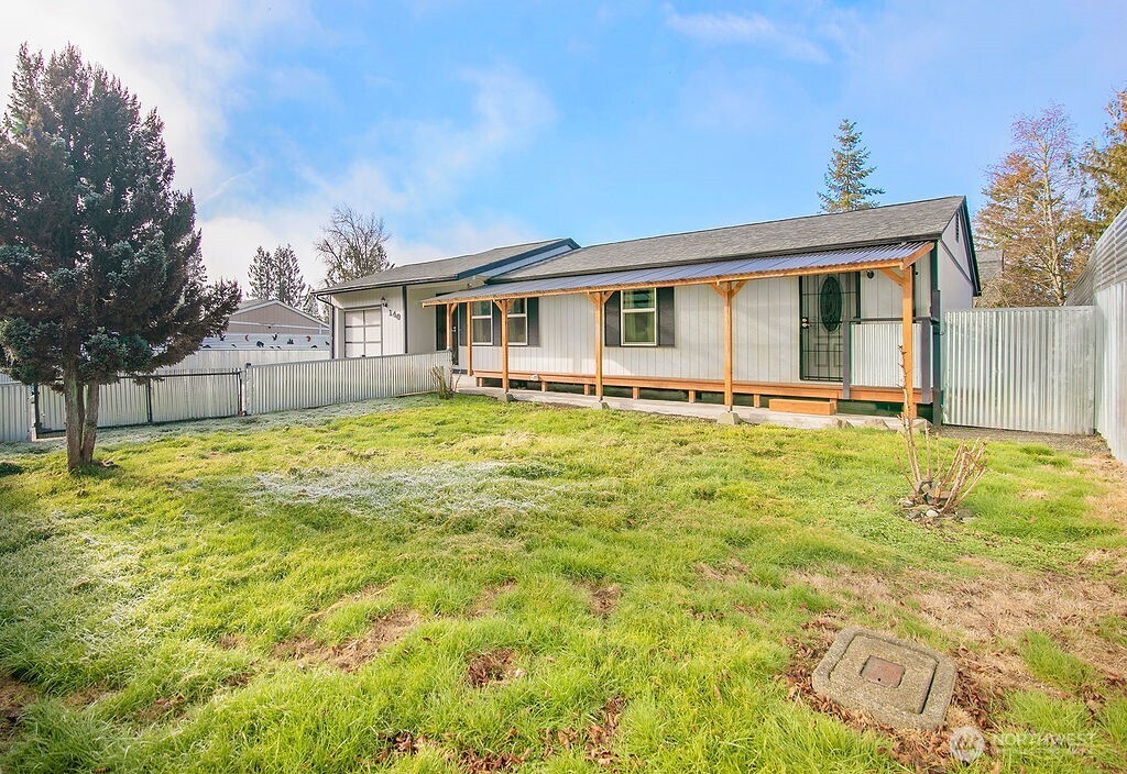 140 Rodgers Road Silverlake, WA 98645 - Photo 31 of 35 a house view with swimming pool in front of it