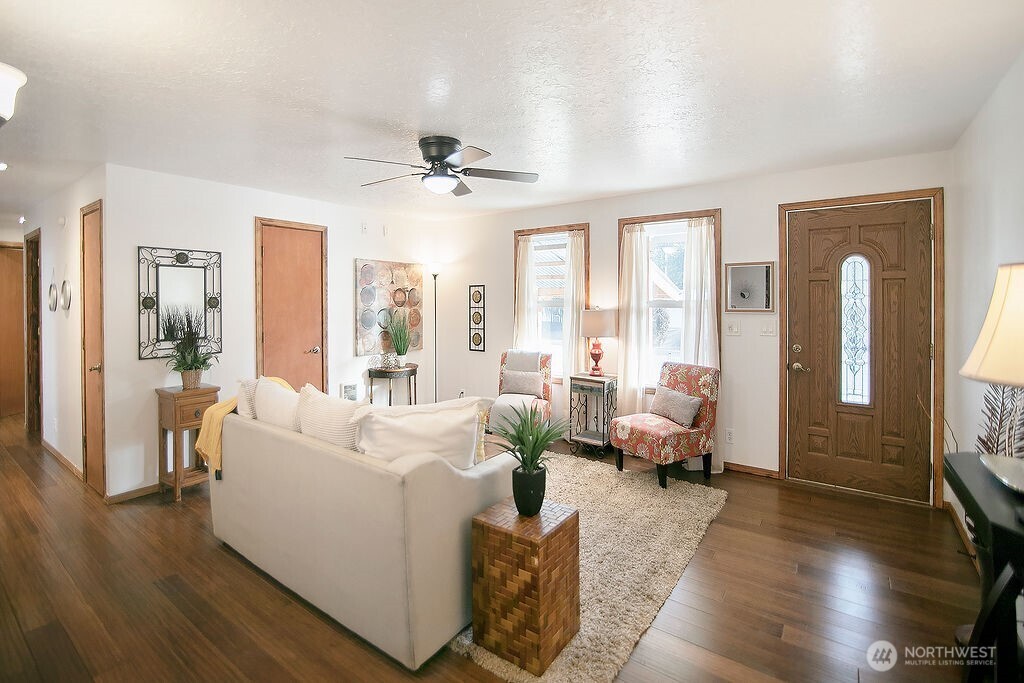 140 Rodgers Road Silverlake, WA 98645 - Photo 7 of 35 a living room with furniture and a flat screen tv