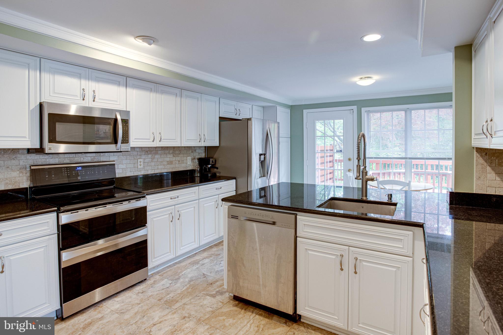 1542 Deer Point Way Reston, VA 20194 - Photo 22 of 68 Kitchen with Stainless Steel Appliances