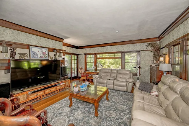 a kitchen with a sink and large window