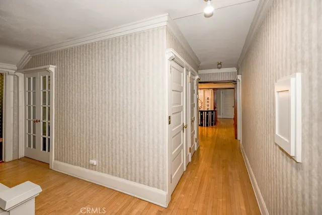 a living room with furniture a rug and a chandelier