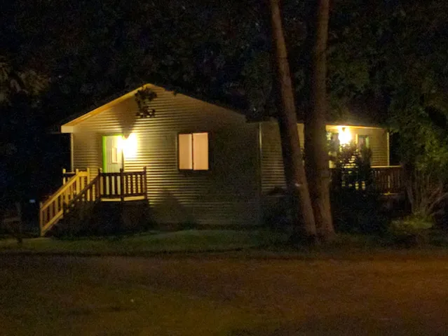 a front view of a house having yard