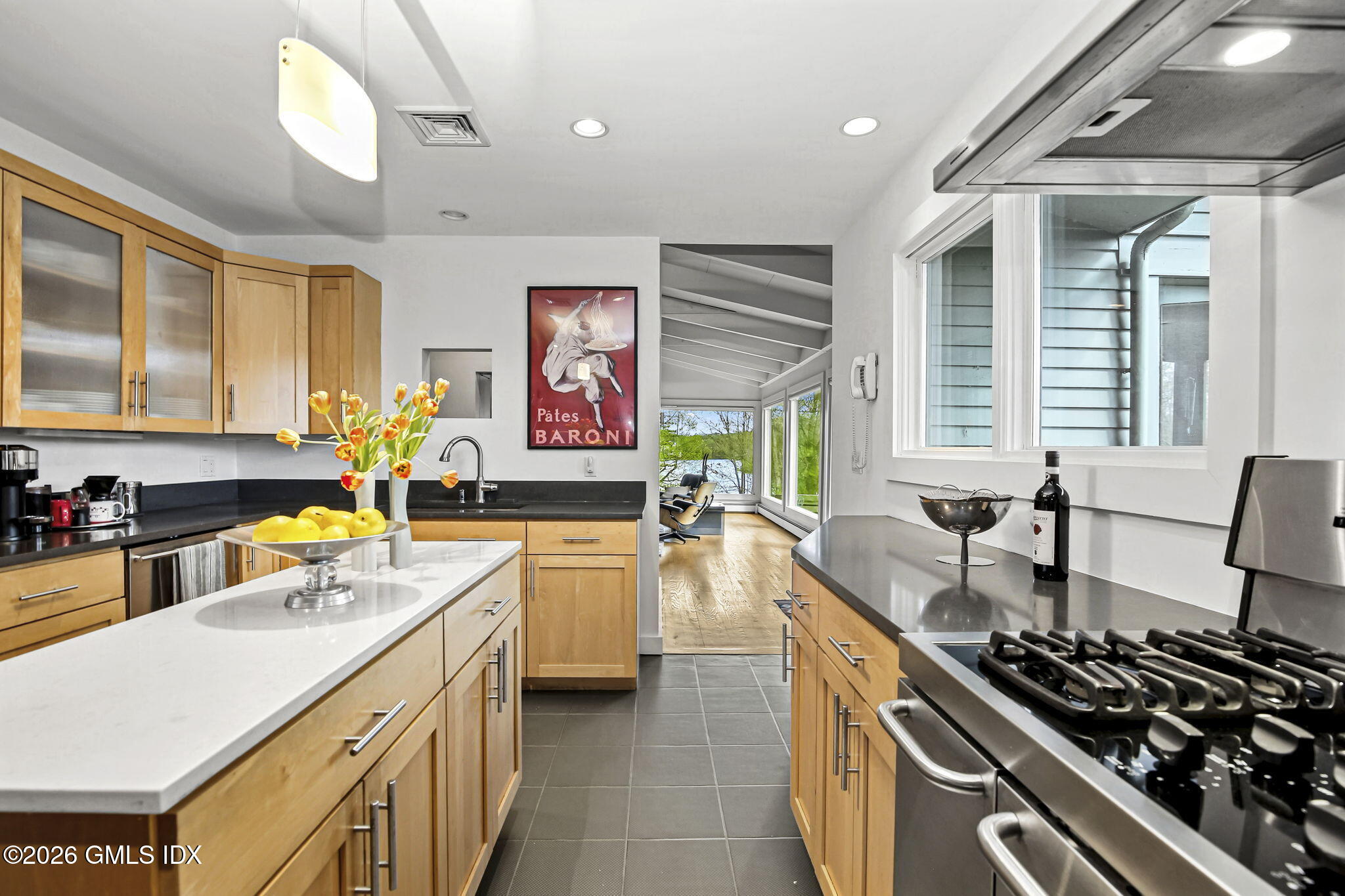 185 Valley Road Cos Cob, CT 06807 - Photo 15 of 38 a kitchen with a stove a sink and a refrigerator
