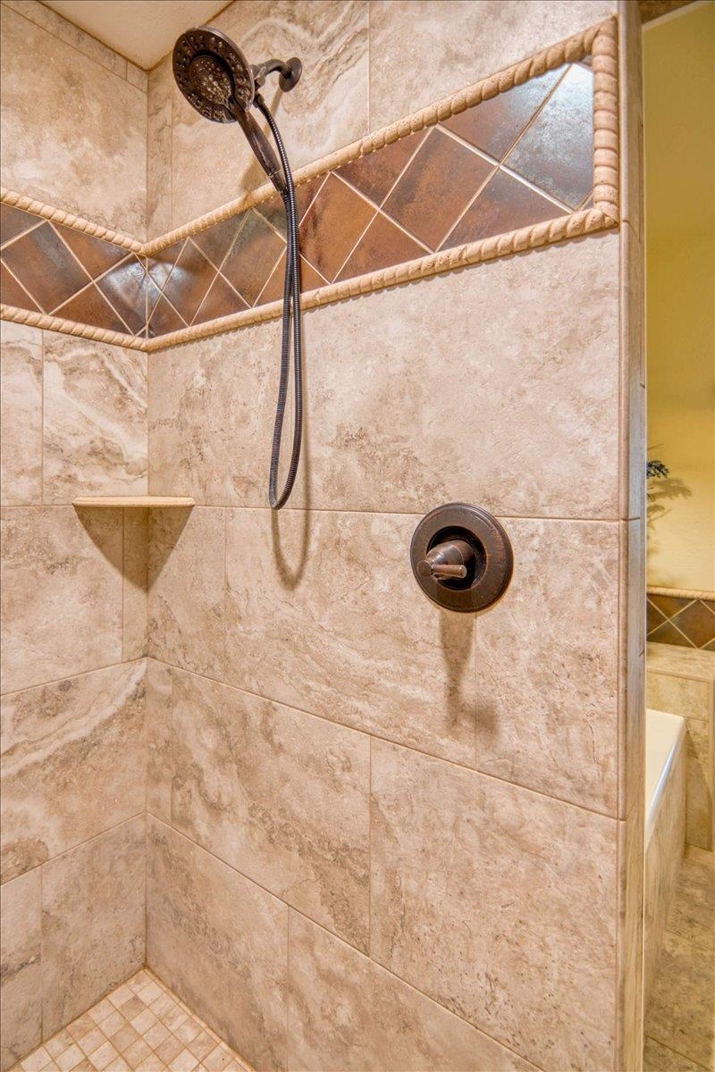 243 East Flag Creek Ranch Road Llano, TX 78643 - Photo 20 of 29 a bathroom with a shower