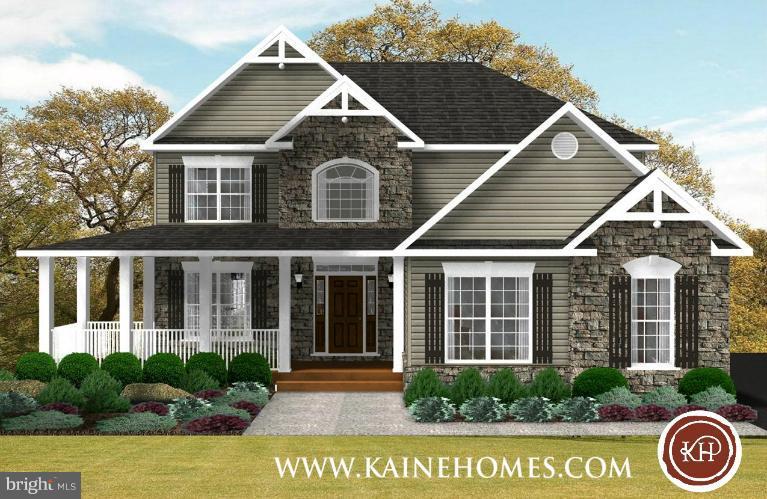 2107 Baythorne Road Prince Frederick, MD 20678 - Photo 1 of 7 a view of house with yard and outdoor seating