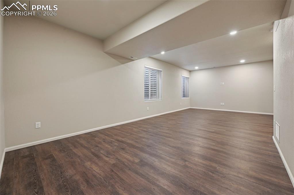 6640 Backcountry Loop Colorado Springs, CO 80927 - Photo 39 of 49 wooden floor in an empty room with a window