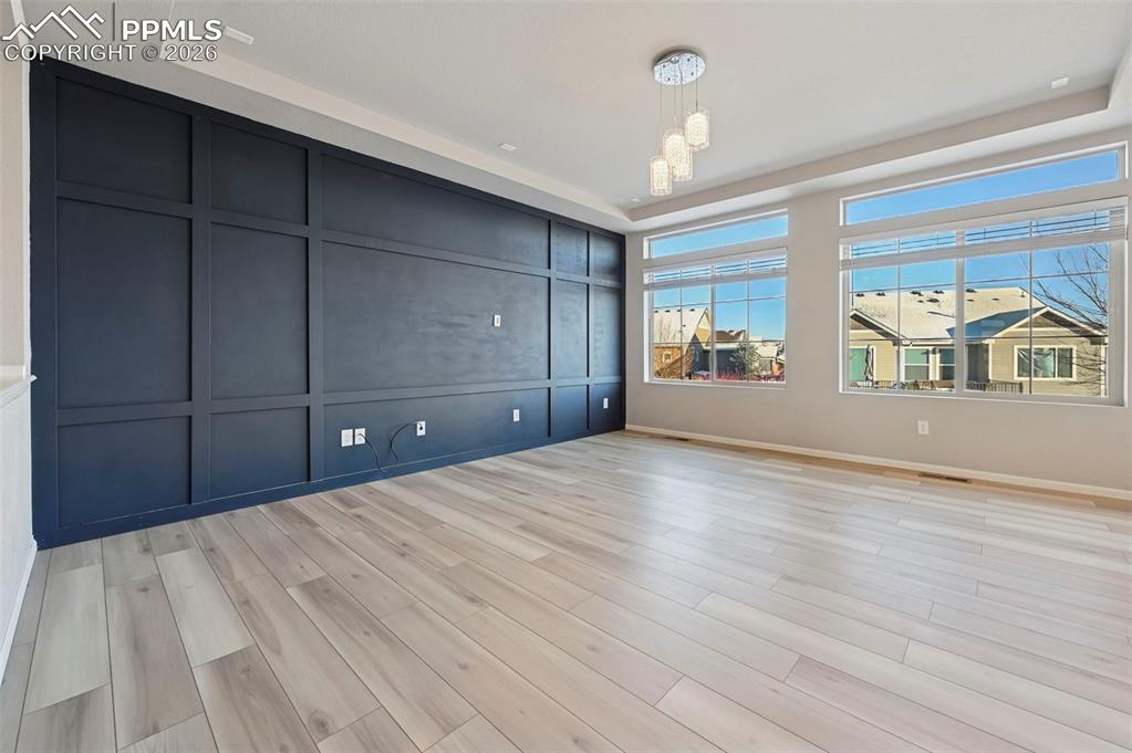 6640 Backcountry Loop Colorado Springs, CO 80927 - Photo 9 of 49 a bedroom with a bed and a dresser