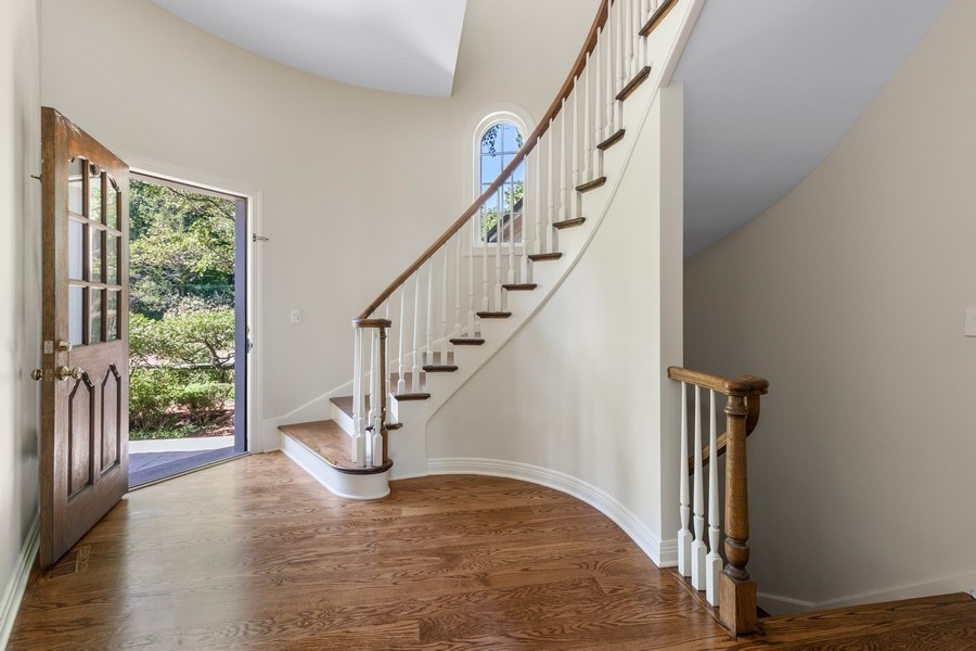 55 Stone Gate Road Lake Forest, IL 60045 - Photo 25 of 62 a view of entryway and hall with wooden floor