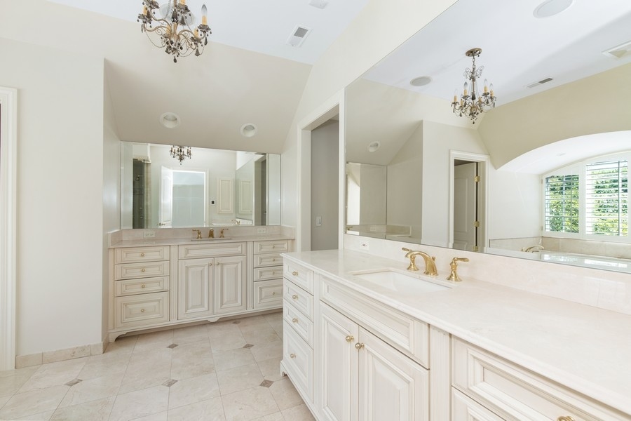 55 Stone Gate Road Lake Forest, IL 60045 - Photo 27 of 62 a bathroom with a double vanity sink mirror and
