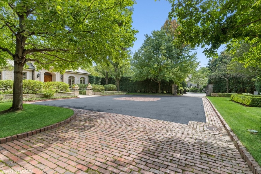 55 Stone Gate Road Lake Forest, IL 60045 - Photo 4 of 62 a view of house with yard and green space