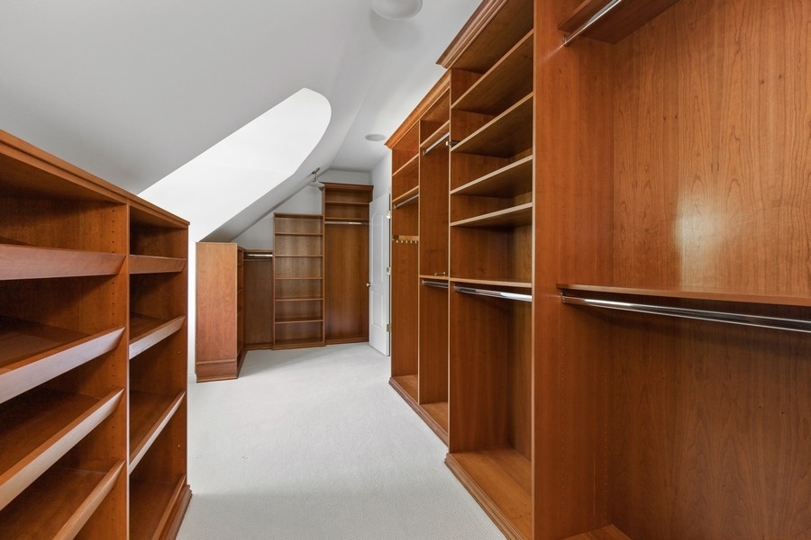 55 Stone Gate Road Lake Forest, IL 60045 - Photo 31 of 62 a view of walk in closet with empty racks