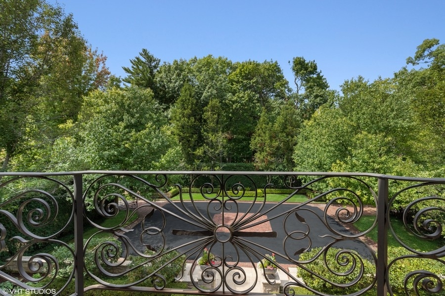 55 Stone Gate Road Lake Forest, IL 60045 - Photo 34 of 62 a view of a balcony with chairs