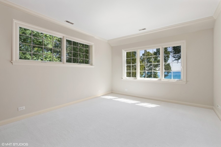 55 Stone Gate Road Lake Forest, IL 60045 - Photo 37 of 62 an empty room with windows