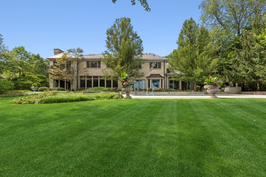55 Stone Gate Road Lake Forest, IL 60045 - Photo 57 of 62 a view of a building with a yard