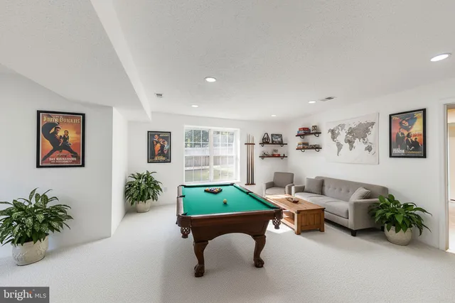a view of a hallway with a kitchen