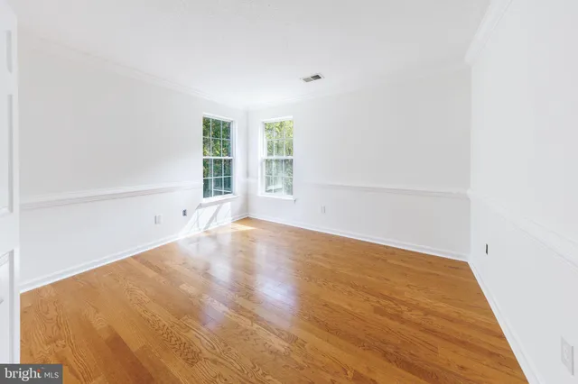 a view of an entryway with a floor to ceiling window