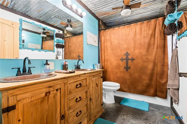 a view of a big yard with swimming pool and large tree