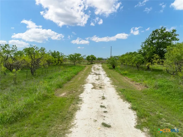 a view of backyard with green space