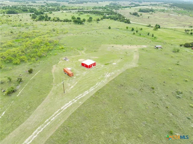 a view of an ocean and a yard