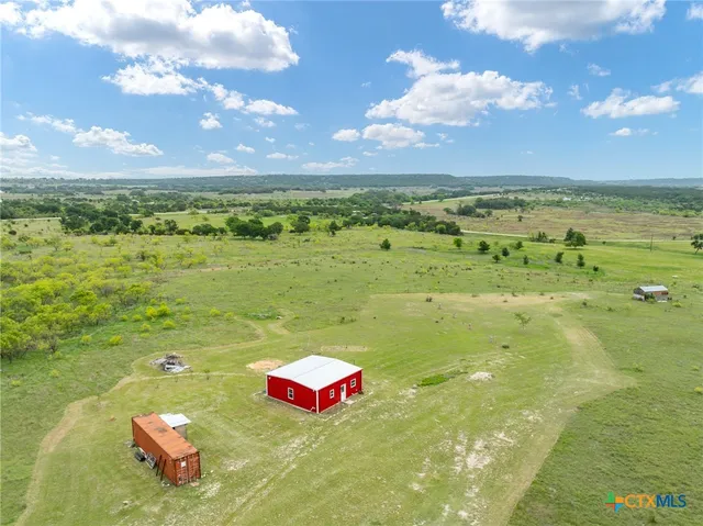 a view of an ocean and a mountain