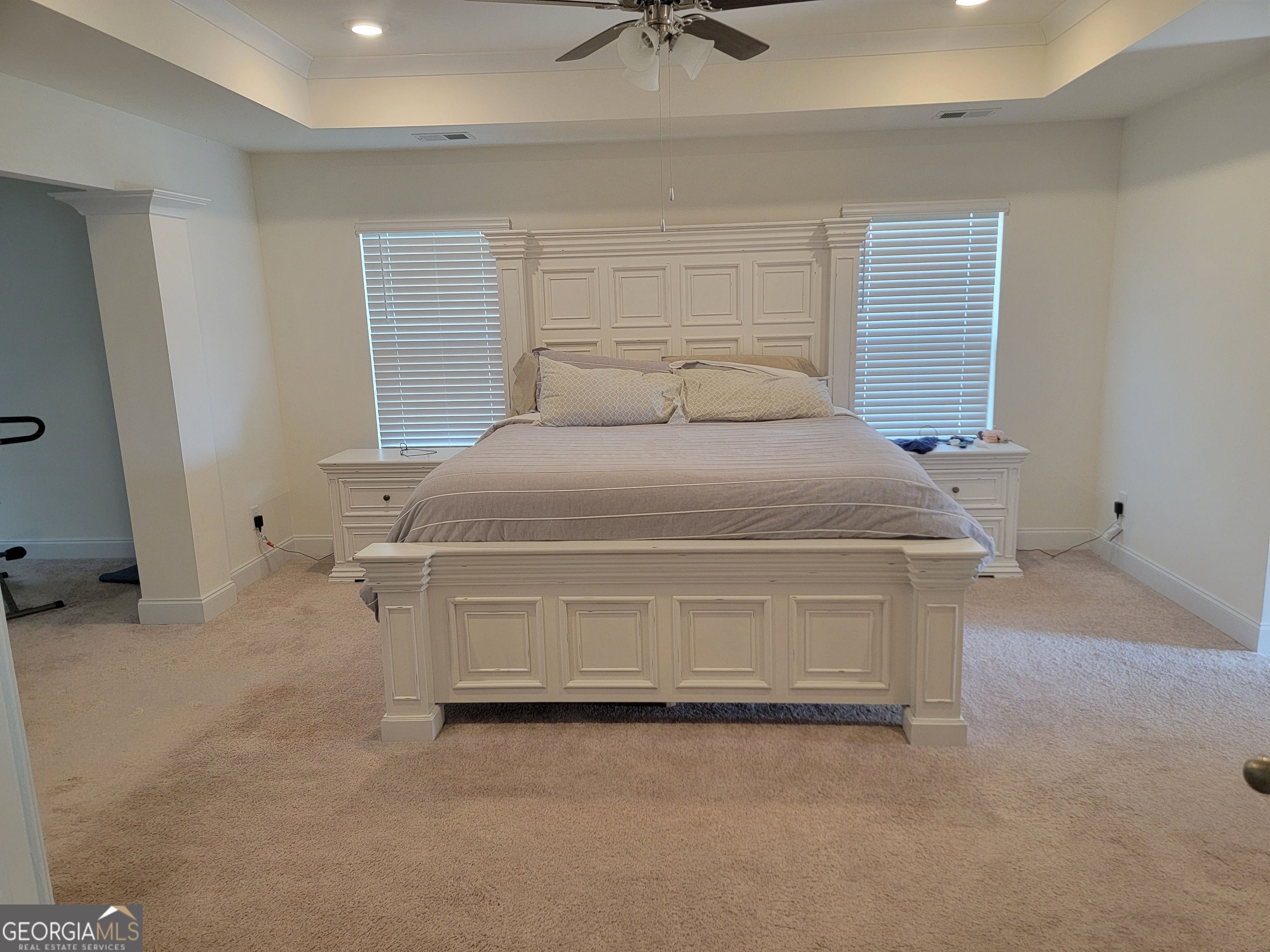 640 Edgar Street Hampton, GA 30228 - Photo 2 of 86 a room with a bed and ceiling fan