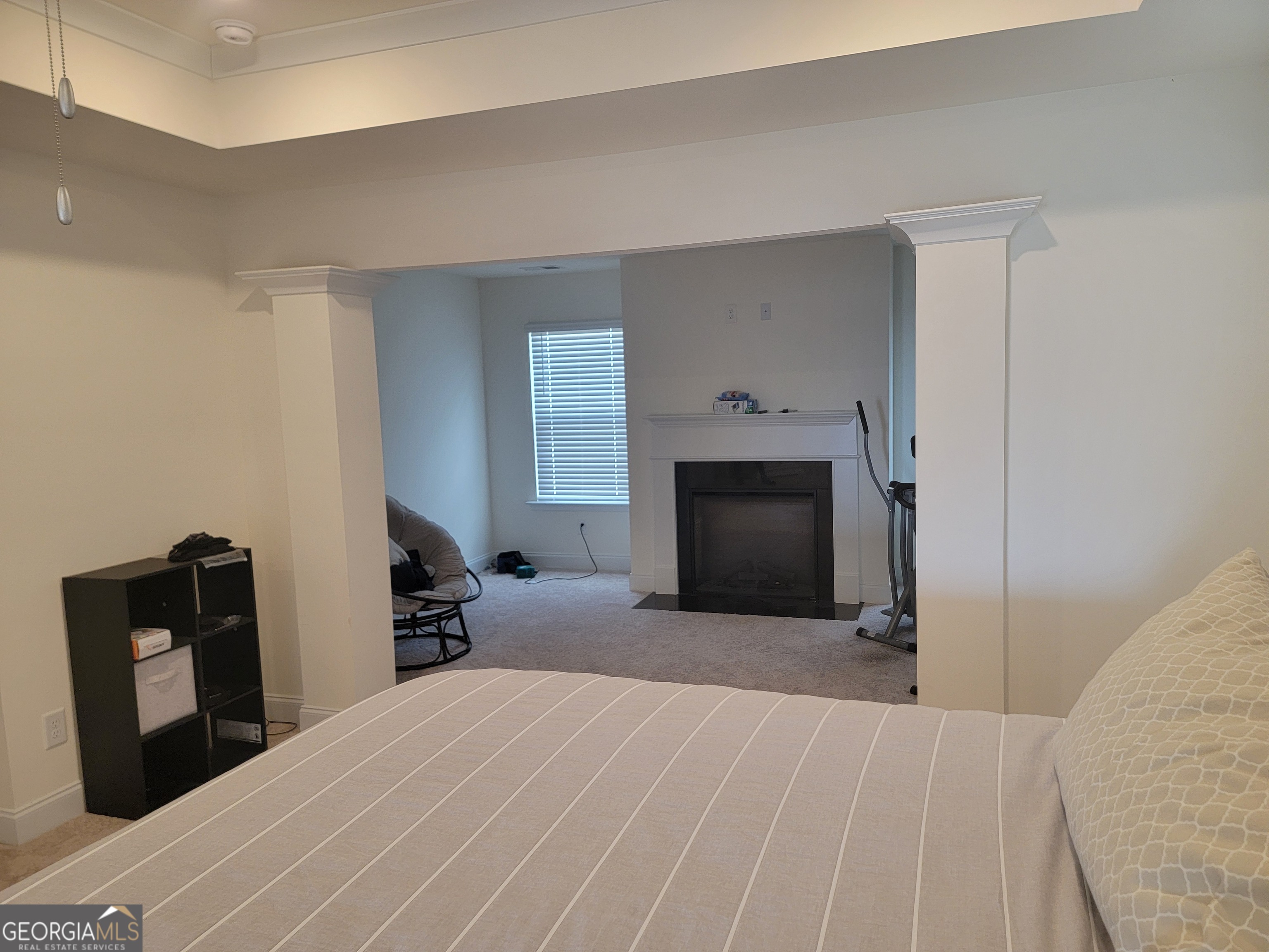 640 Edgar Street Hampton, GA 30228 - Photo 69 of 86 a bedroom with a bed and a fireplace