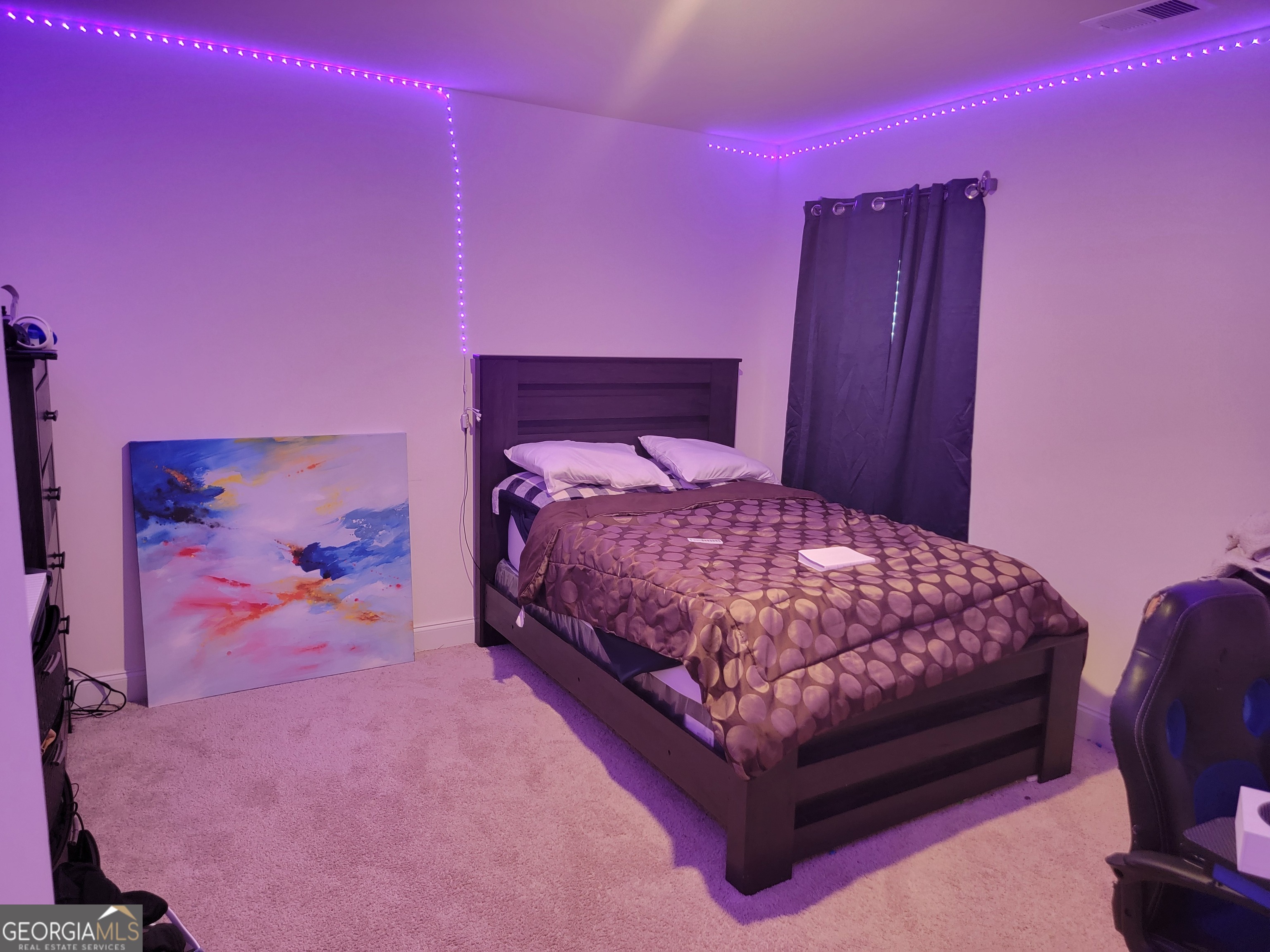 640 Edgar Street Hampton, GA 30228 - Photo 76 of 86 a bed room with a bed and a chair