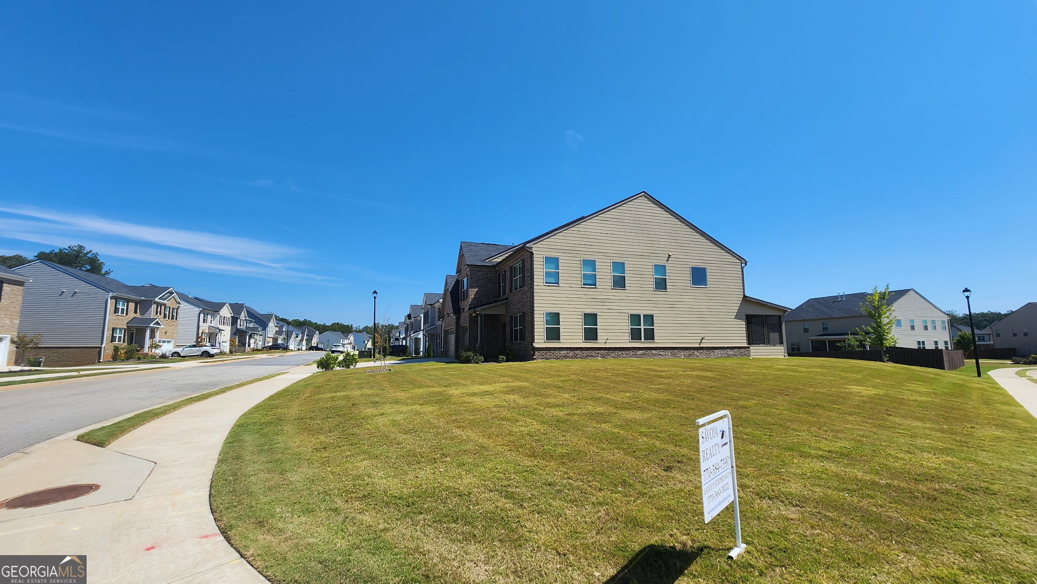 640 Edgar Street Hampton, GA 30228 - Photo 81 of 86 a front view of a house with a yard