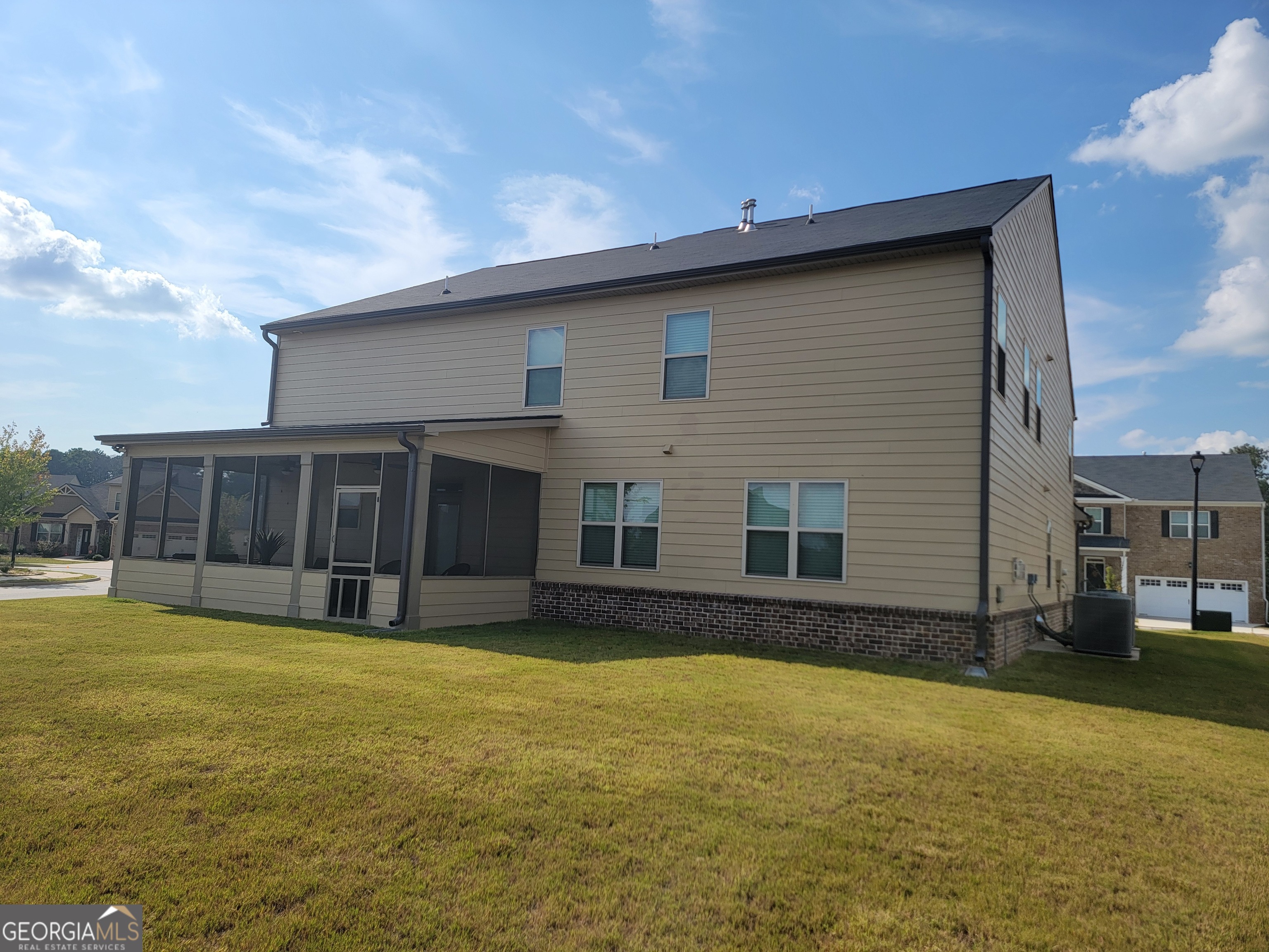640 Edgar Street Hampton, GA 30228 - Photo 85 of 86 a view of a house with a yard