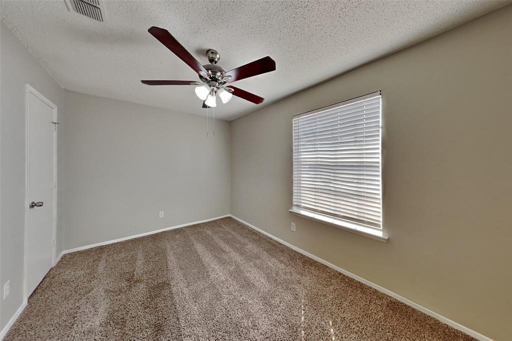 6421 Old Mill Circle Watauga, TX 76148 - Photo 14 of 18 a view of an empty room with a window