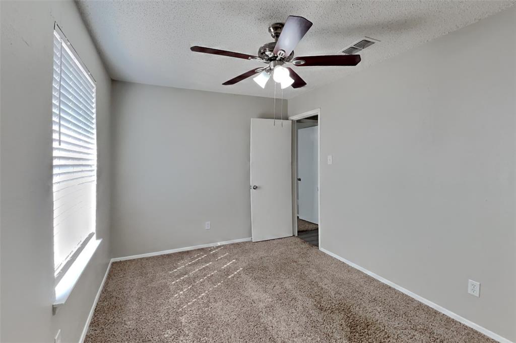 6421 Old Mill Circle Watauga, TX 76148 - Photo 15 of 18 a view of an empty room with a window