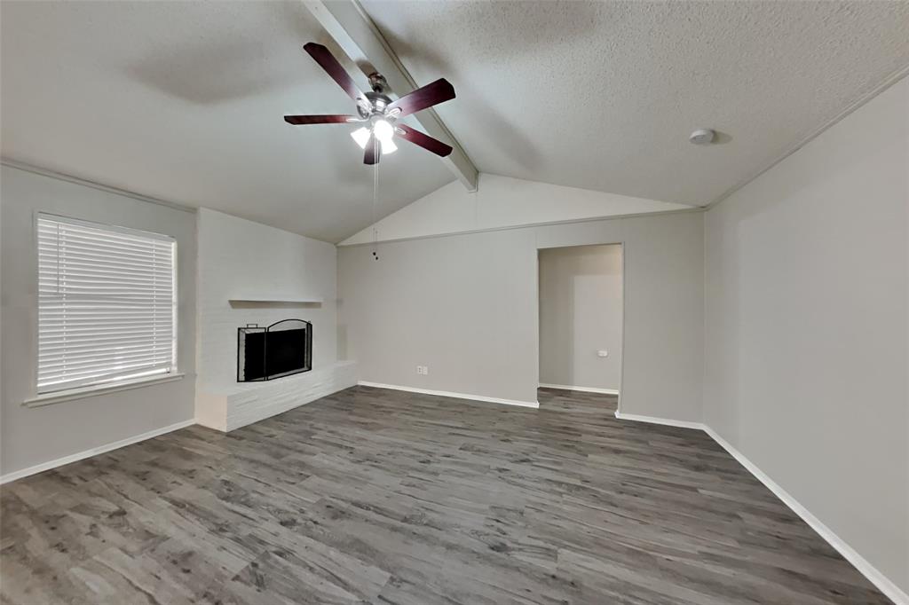 6421 Old Mill Circle Watauga, TX 76148 - Photo 3 of 18 a view of an empty room with wooden floor and a window