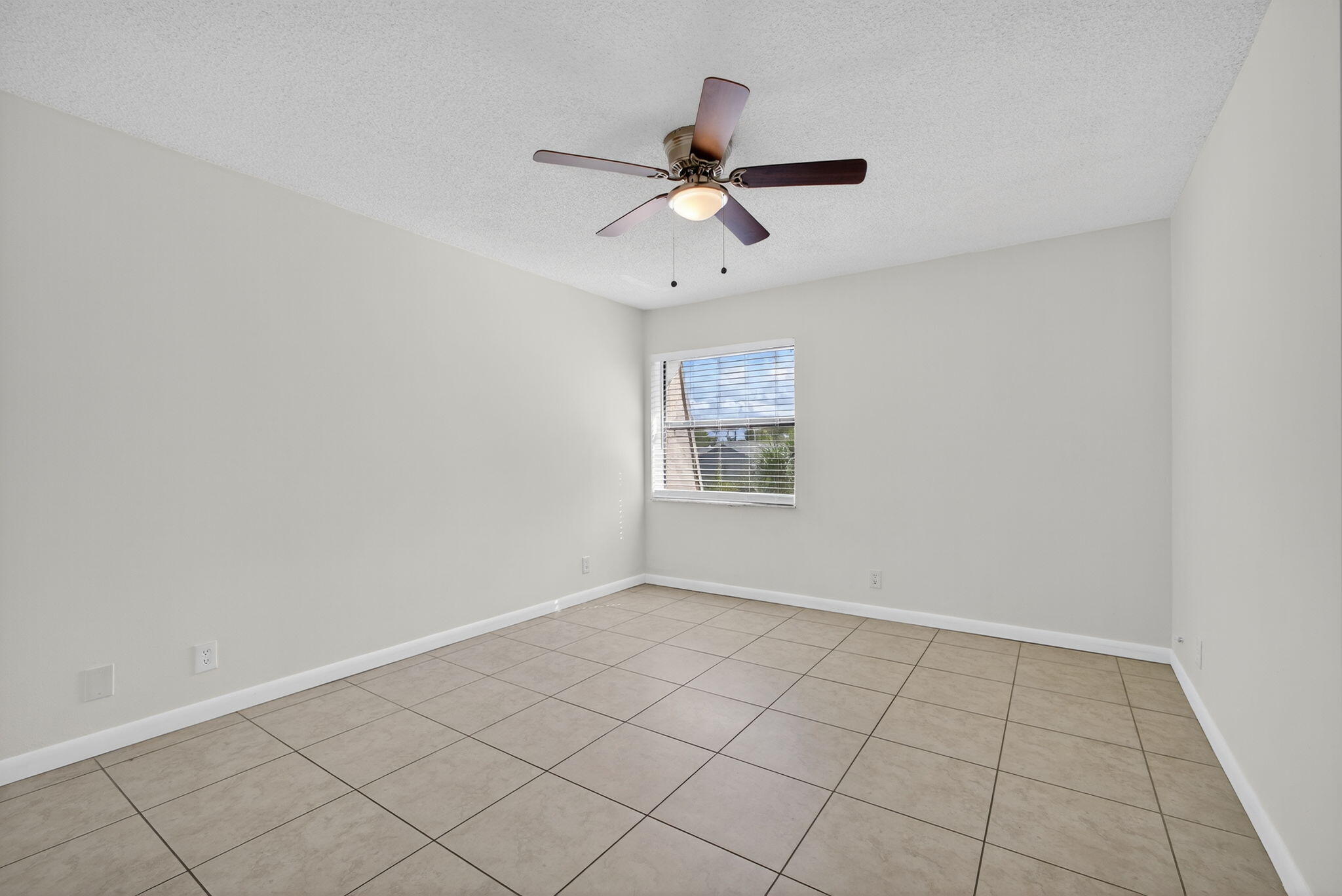 1580 Montauk Drive, Unit 1582 Wellington, FL 33414 - Photo 15 of 28 a view of an empty room and window