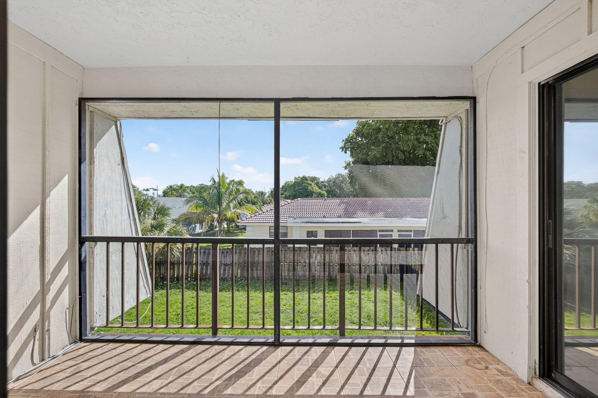 1580 Montauk Drive, Unit 1582 Wellington, FL 33414 - Photo 25 of 28 a view of balcony with wooden floor
