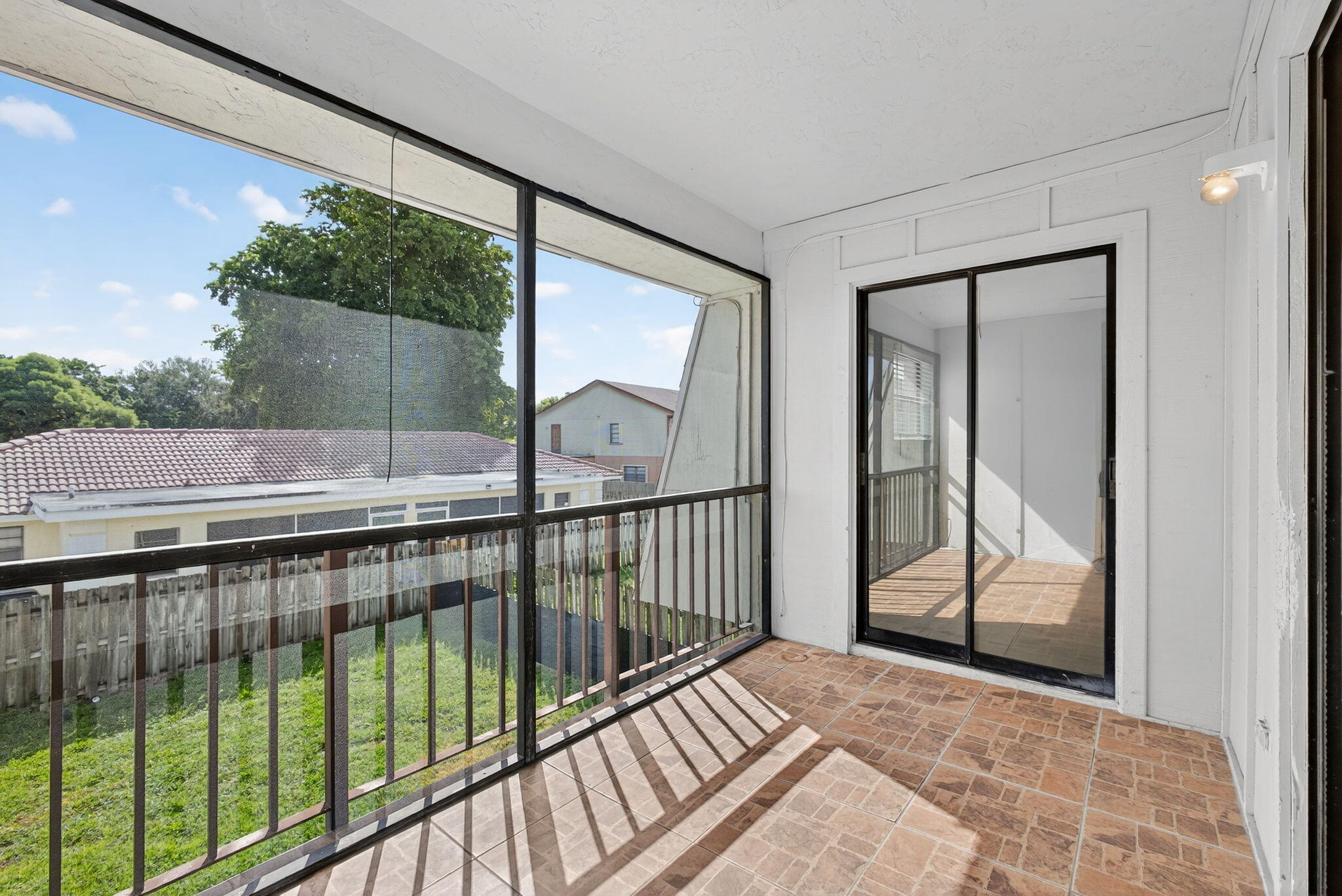 1580 Montauk Drive, Unit 1582 Wellington, FL 33414 - Photo 26 of 28 a view of balcony with wooden floor