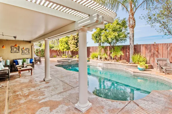 a view of living room with furniture and garden
