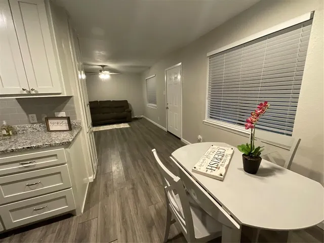 a view of a dining room with furniture