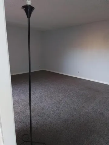 a view of a room with a fan