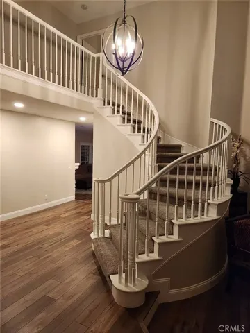 a view of entryway with wooden floor