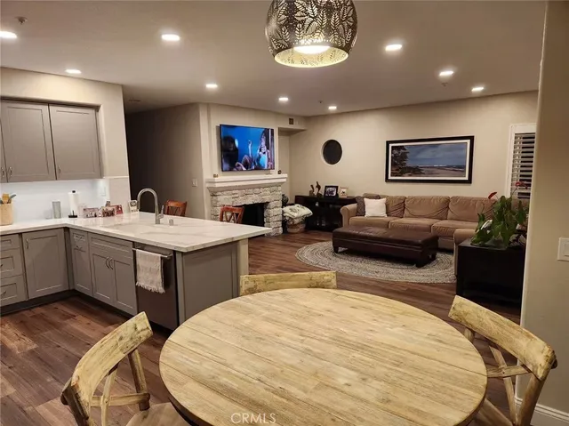 a very nice looking living room with a large window