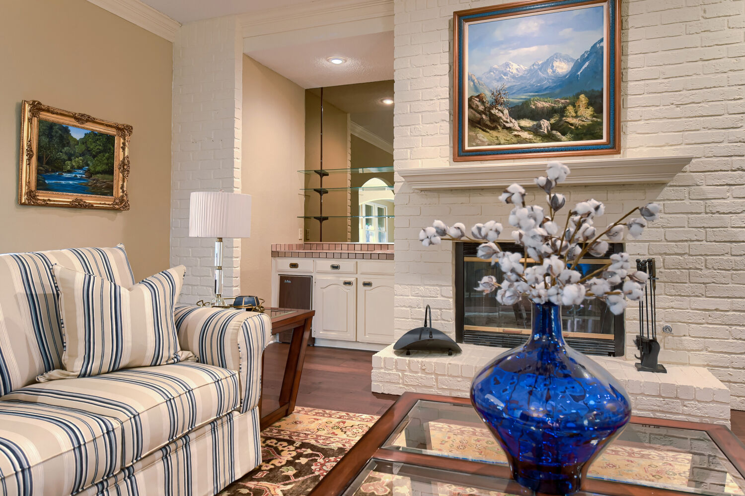 10904 Legends Lane Austin, TX 78747 - Photo 18 of 38 Gorgeous living room with gas fireplace and wetbar.