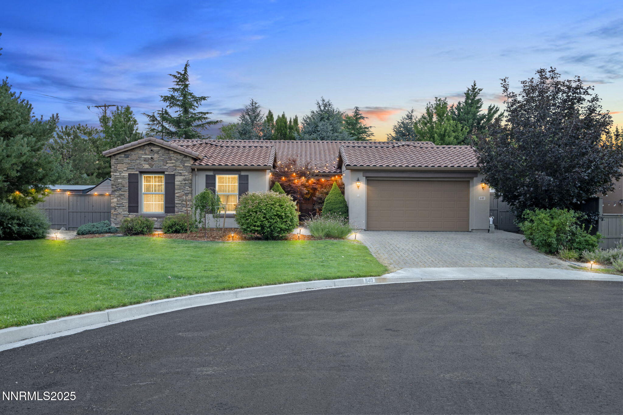 640 Preakness Court Reno, NV 89521 - Photo 1 of 59 a front view of a house with a yard and garage