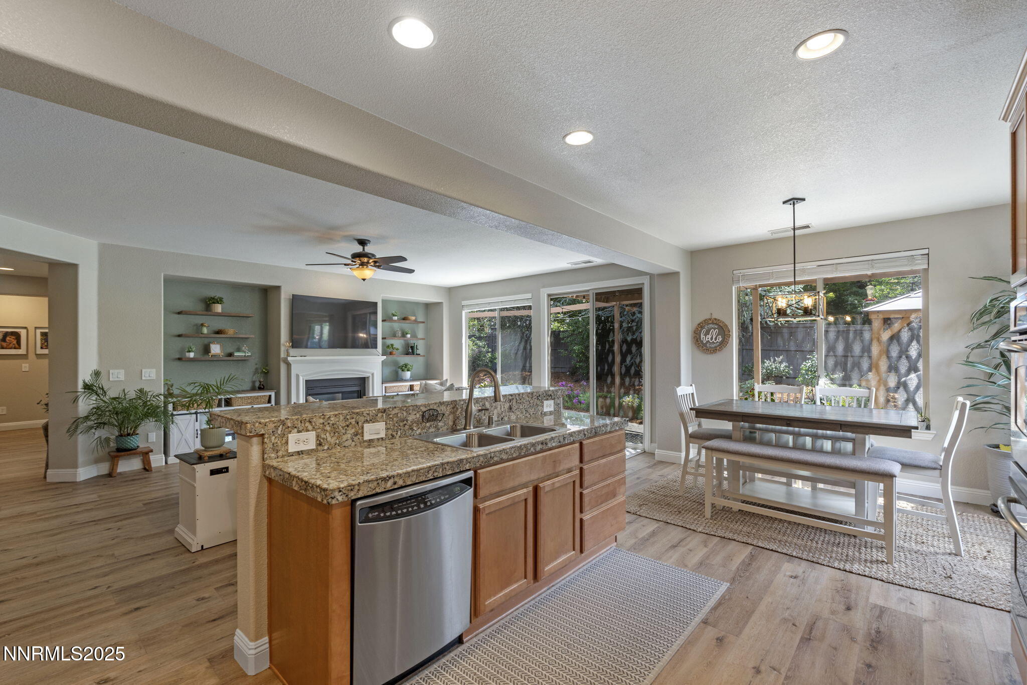 640 Preakness Court Reno, NV 89521 - Photo 20 of 59 a open kitchen with stainless steel appliances granite countertop a stove and a refrigerator