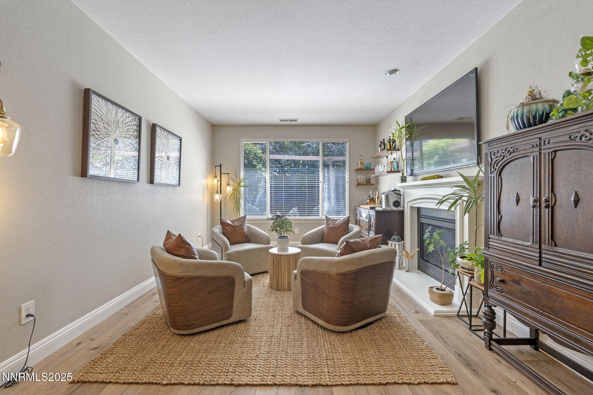 640 Preakness Court Reno, NV 89521 - Photo 26 of 59 a living room with furniture tv and a window