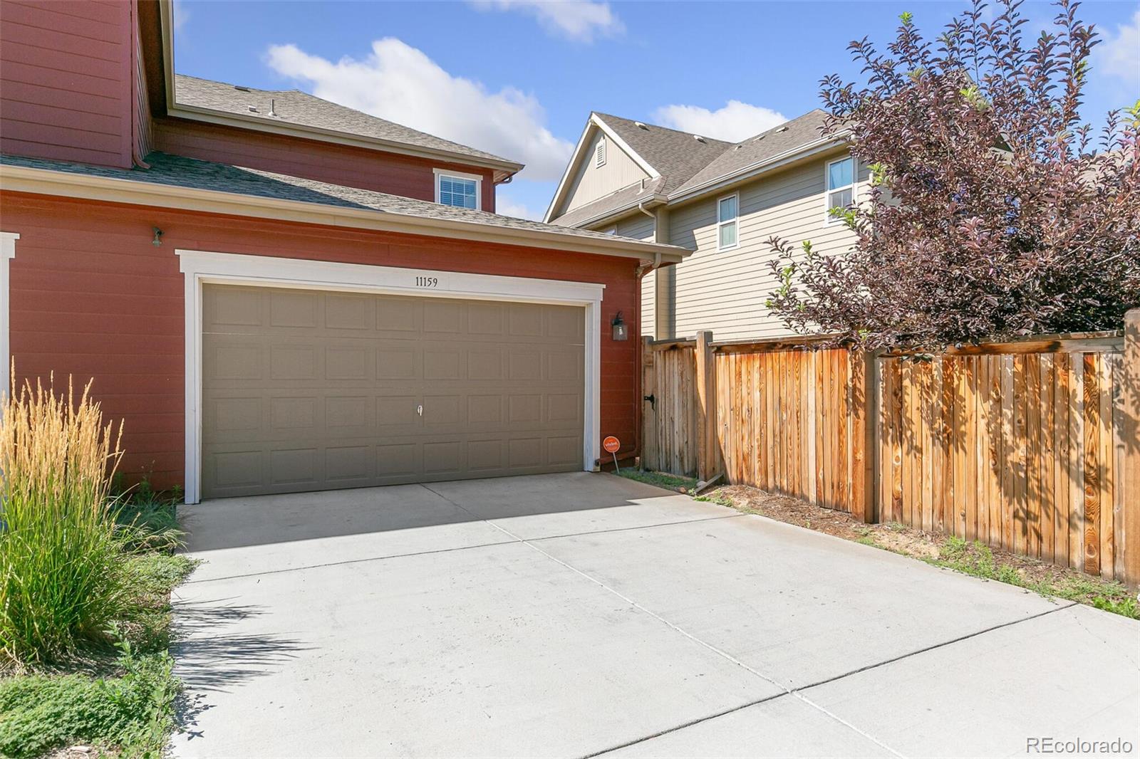 11159 East 25th Drive Aurora, CO 80010 - Photo 21 of 23 a view of a house with a garage