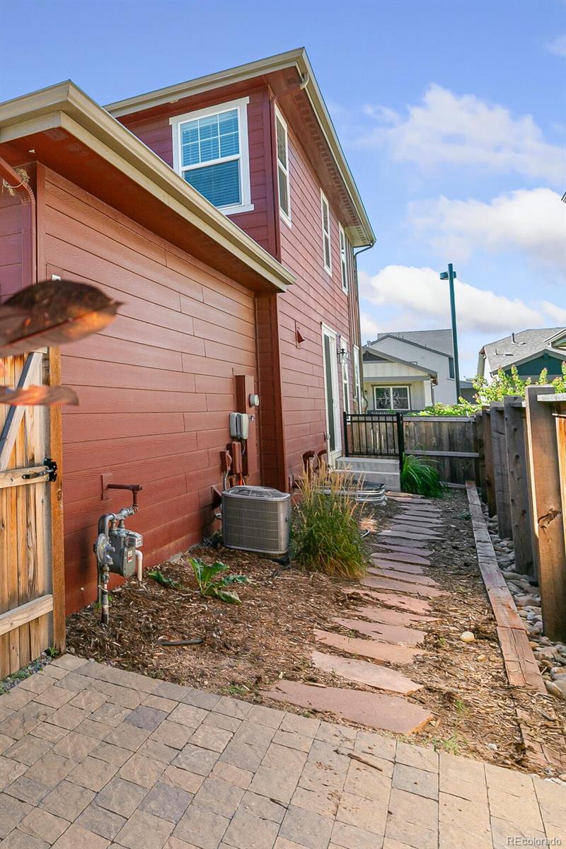 11159 East 25th Drive Aurora, CO 80010 - Photo 22 of 23 a view of a house with backyard and sitting area