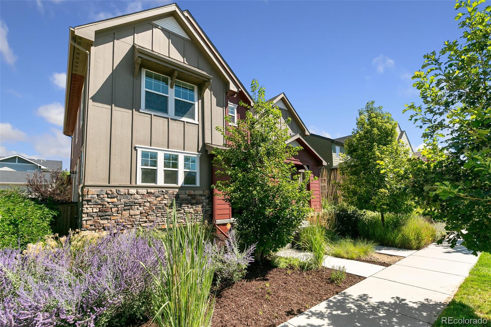 11159 East 25th Drive Aurora, CO 80010 - Photo 23 of 23 a front view of a house with a yard