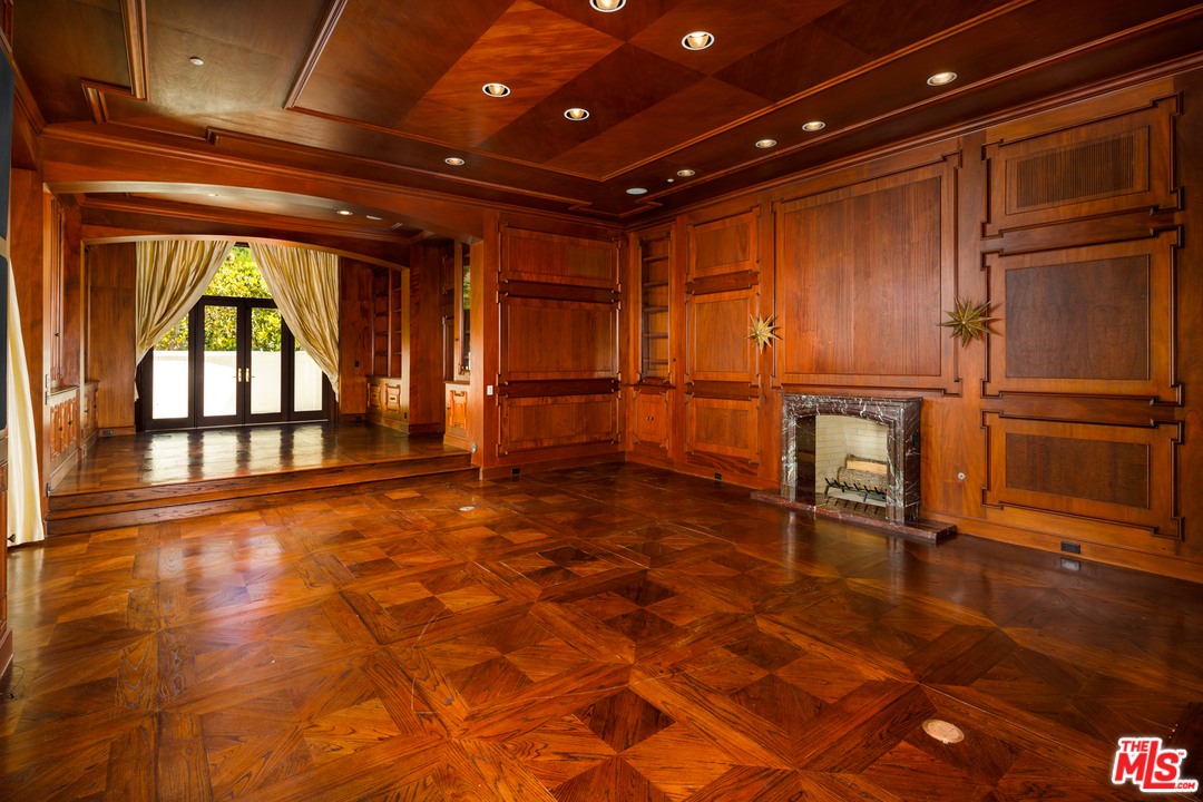 73 Beverly Park Lane Beverly Hills, CA 90210 - Photo 13 of 24 a view of an empty room with a window