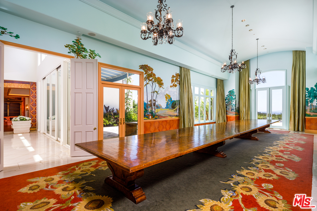73 Beverly Park Lane Beverly Hills, CA 90210 - Photo 15 of 24 a lobby with furniture and wooden floor