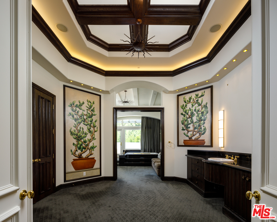 73 Beverly Park Lane Beverly Hills, CA 90210 - Photo 20 of 24 a view of an entryway with front door